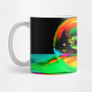 Illuminated light bulb reflecting colors against black background Mug